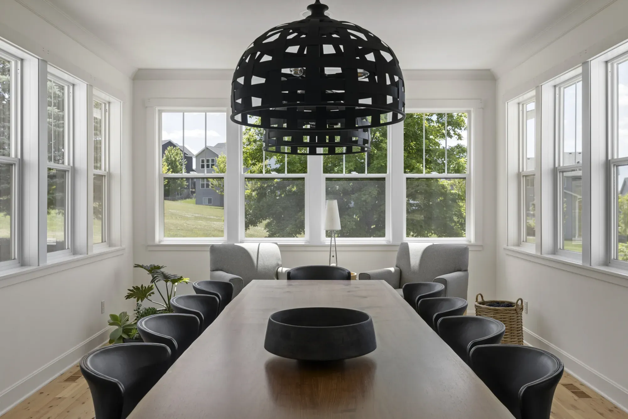 Expanded dining room in Lakeville, MN with windows on three sides and room for a full-size table – Honey-Doers Remodeling